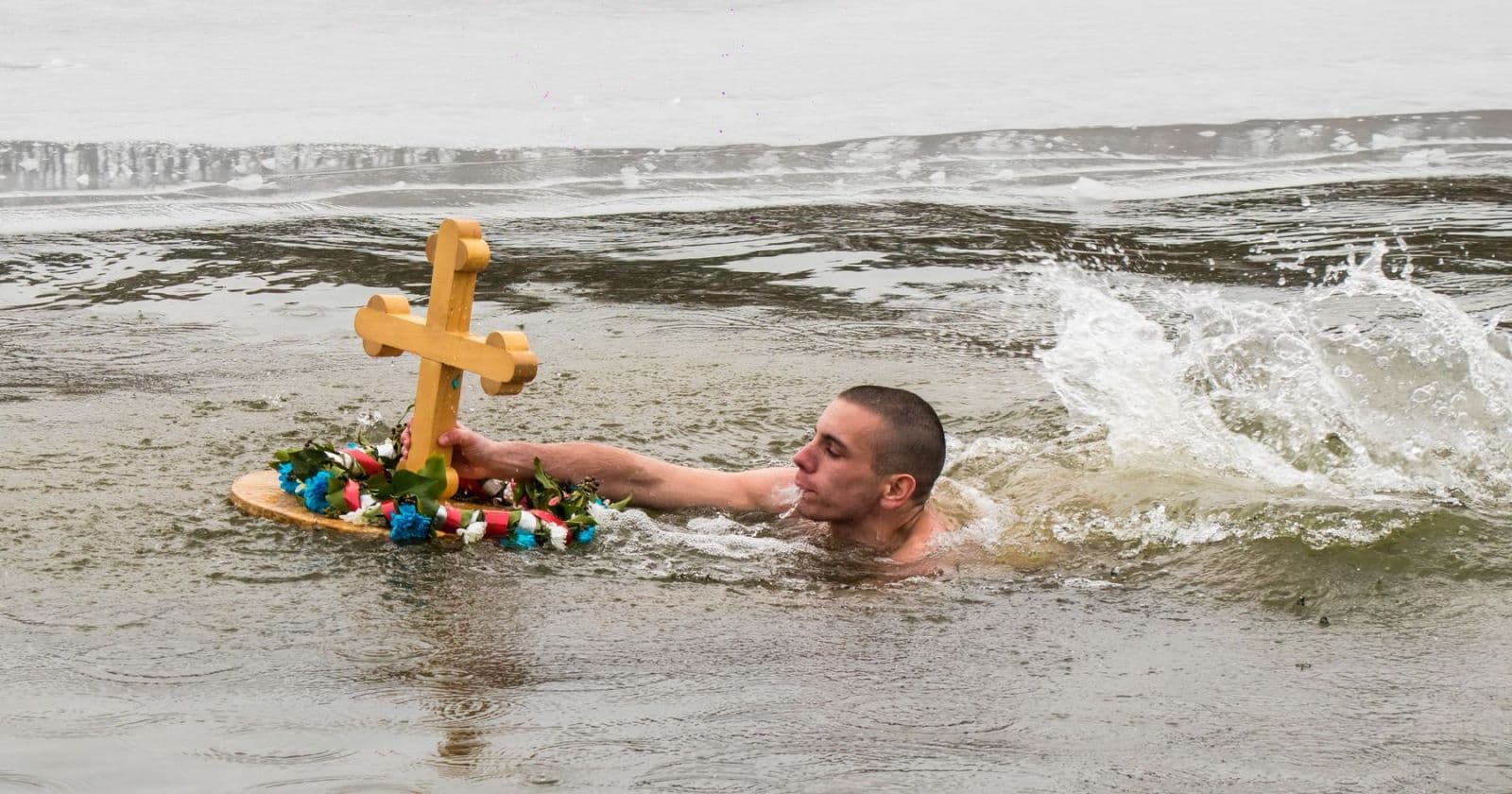Swimming for the Holy Cross